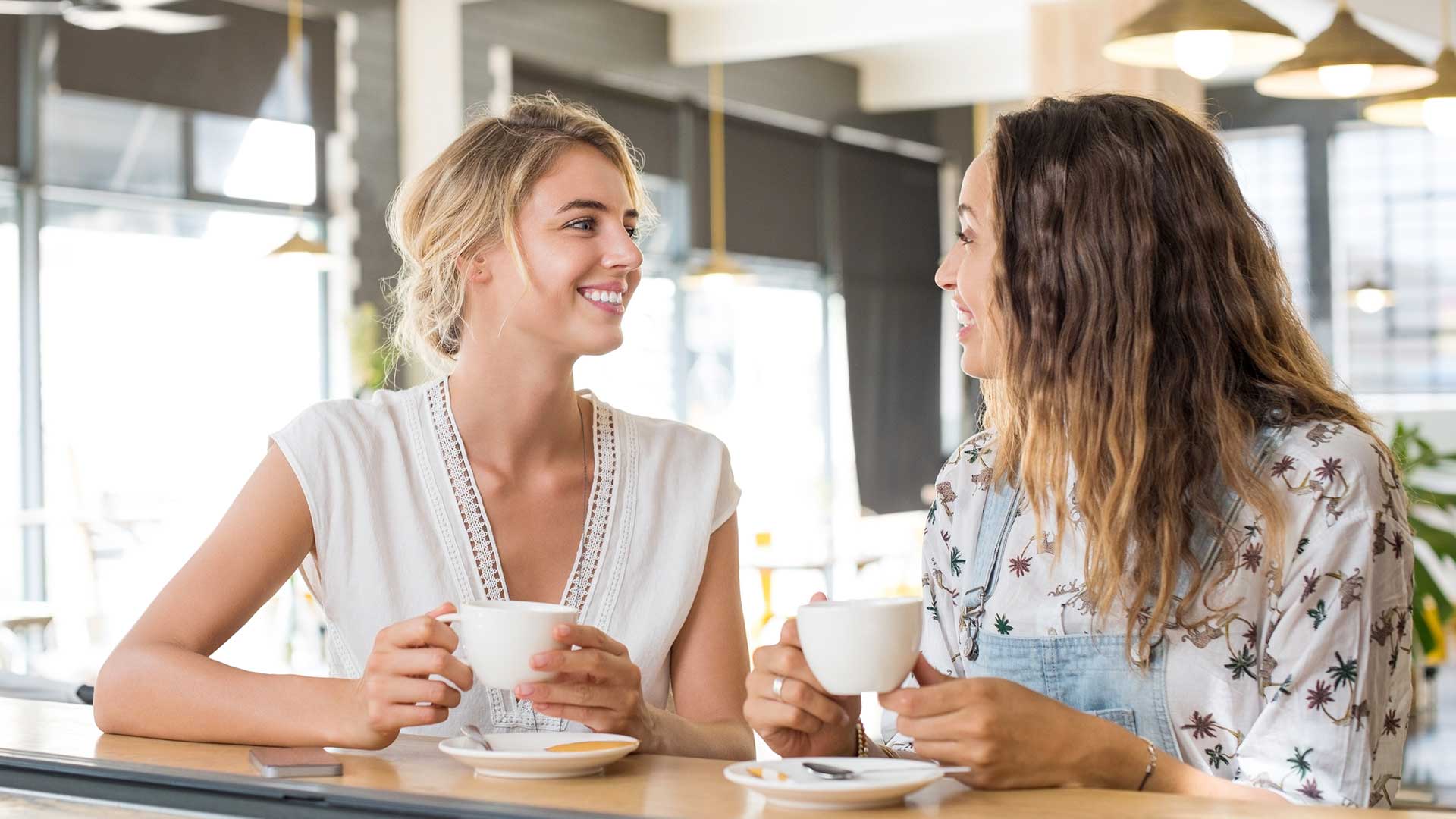 A image of two girls talking used to showcase the Discovery Park multifamily branding that our multifamily marketing agency designed and executed for the client.